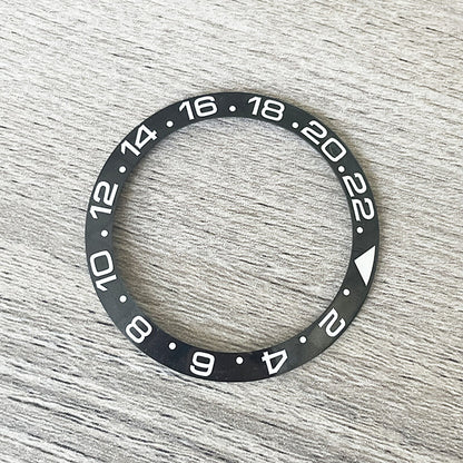 38mm ceramic bezel insert in black with super luminous markers for automatic GMT men's watches.