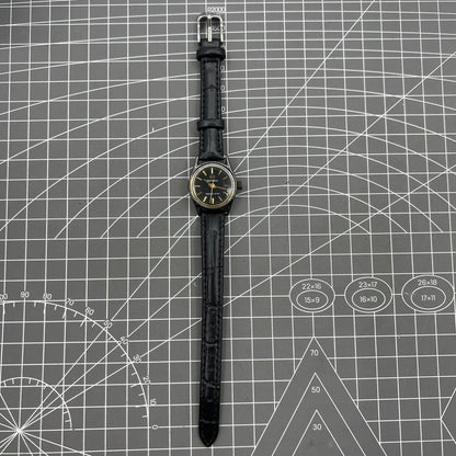 27mm Tianjin Seagull ladies watch with manual mechanical movement and golden nail hour markers.