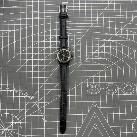 27mm Tianjin Seagull ladies watch with manual mechanical movement and golden nail hour markers.