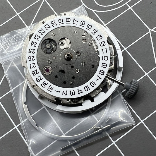 Miyota/Citizen 8215 silver plated watch movement with date at 3 o?clock, automatic mechanical, Japanese precision.