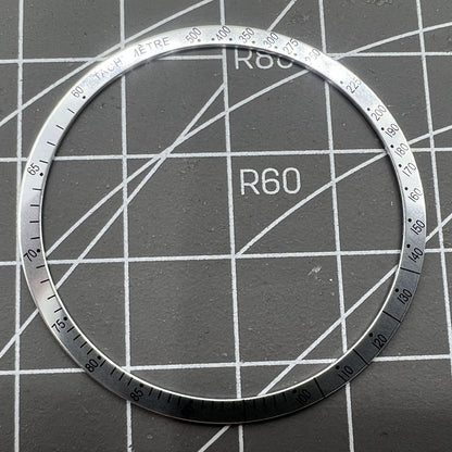 38.5mm Omega Speedmaster aluminum alloy white ring bezel with black font detail for watch customization.