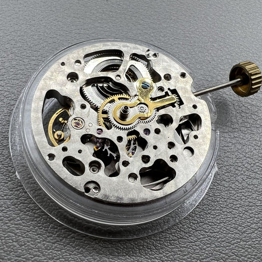 Hollow Hangzhou 2189 watch accessory showing automatic mechanical movement with red rotor and three hands.