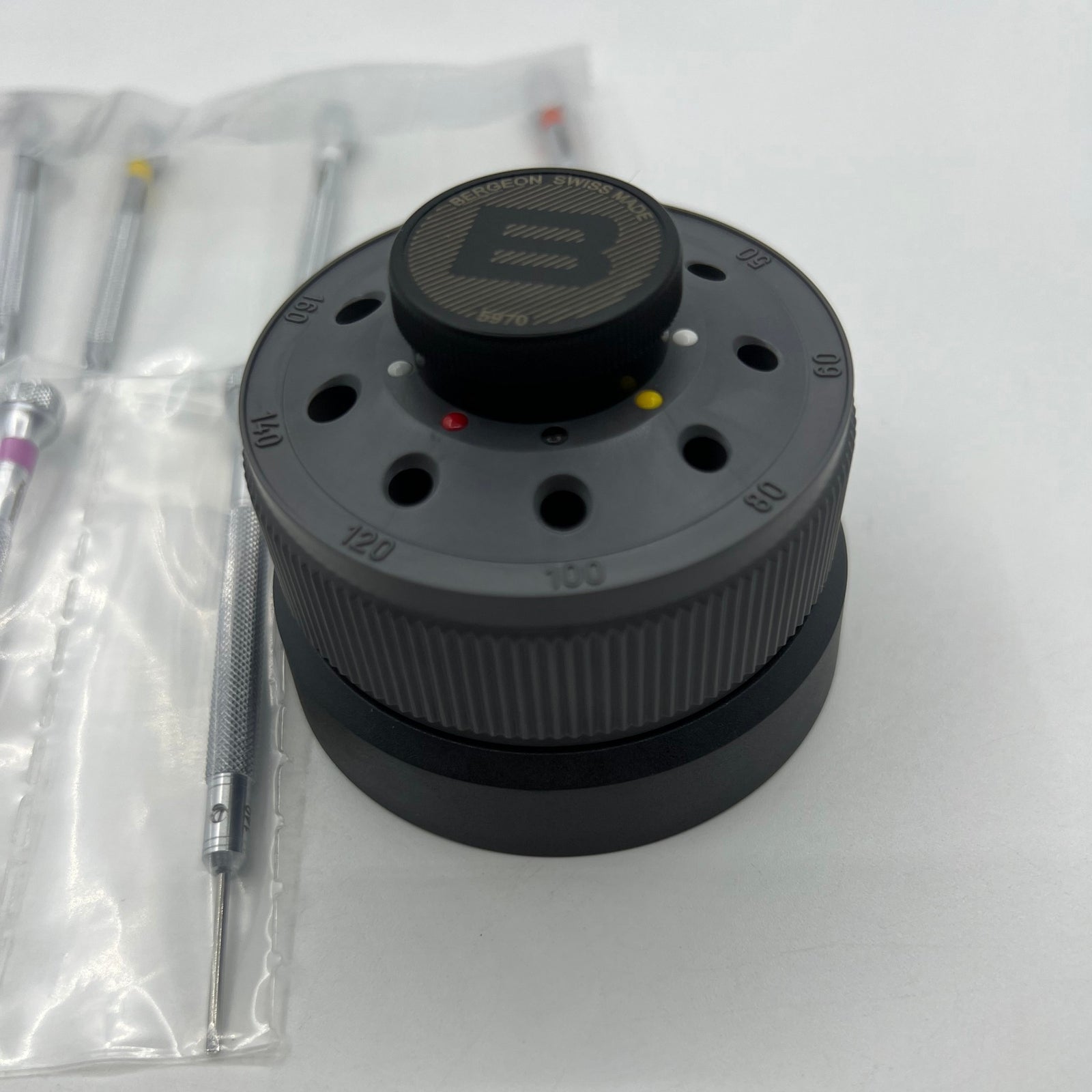 Bergeon 5970 rotating tool set with 9 precision screwdrivers for detailed watch repair, Swiss craftsmanship.