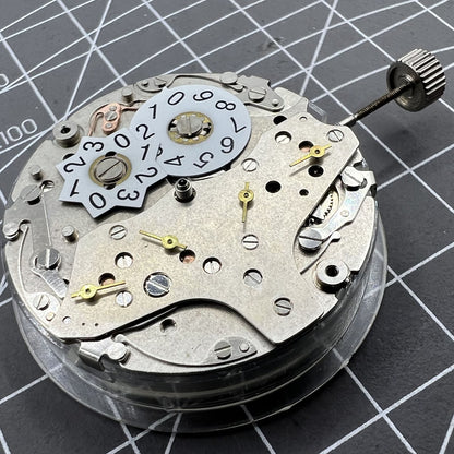 Tianjin Seagull ST25 automatic watch movement showing 3 hands and big date, precision Chinese craftsmanship.