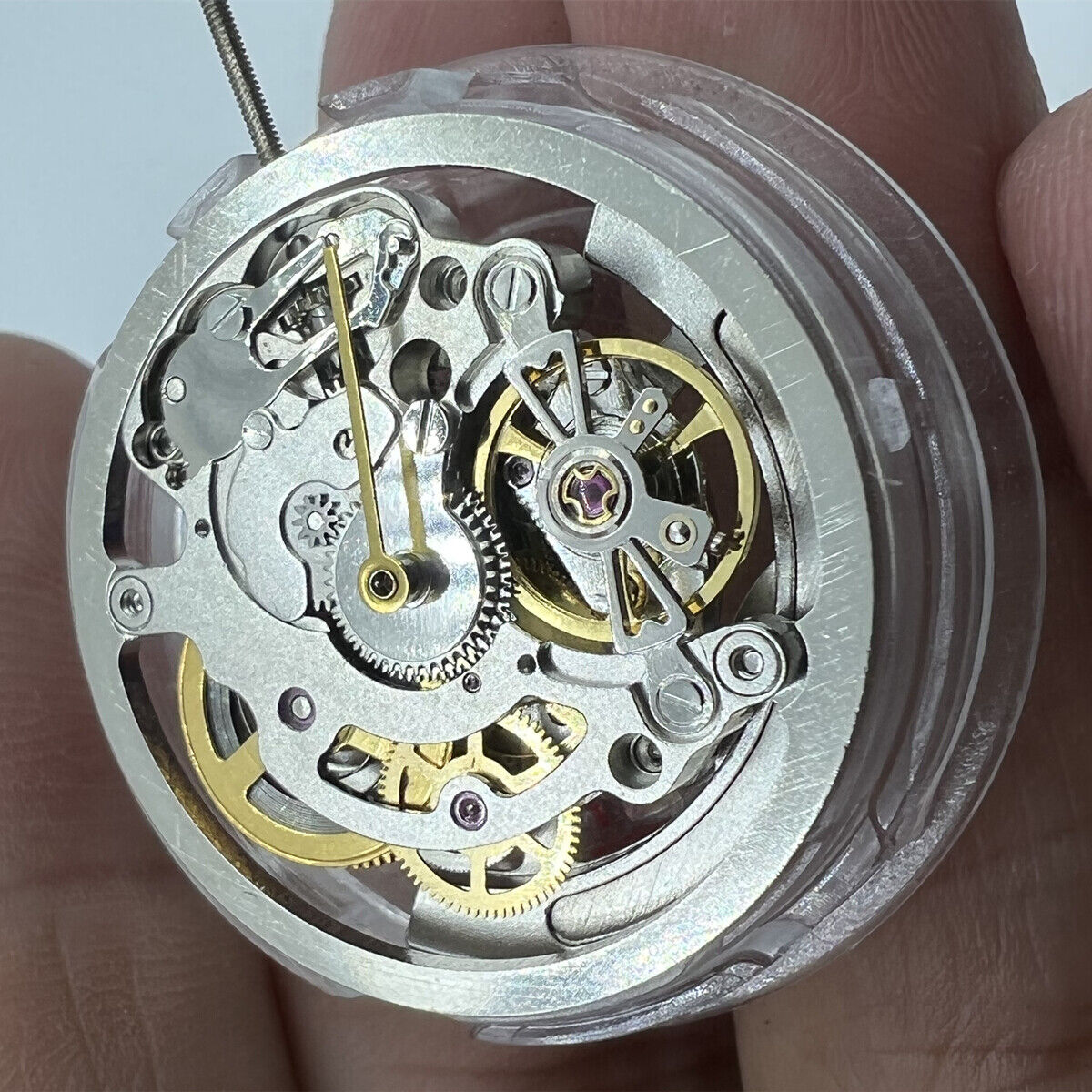 Shanghai Silver hollow watch accessory with multifunctional automatic mechanical movement, elegant design for enthusiasts.