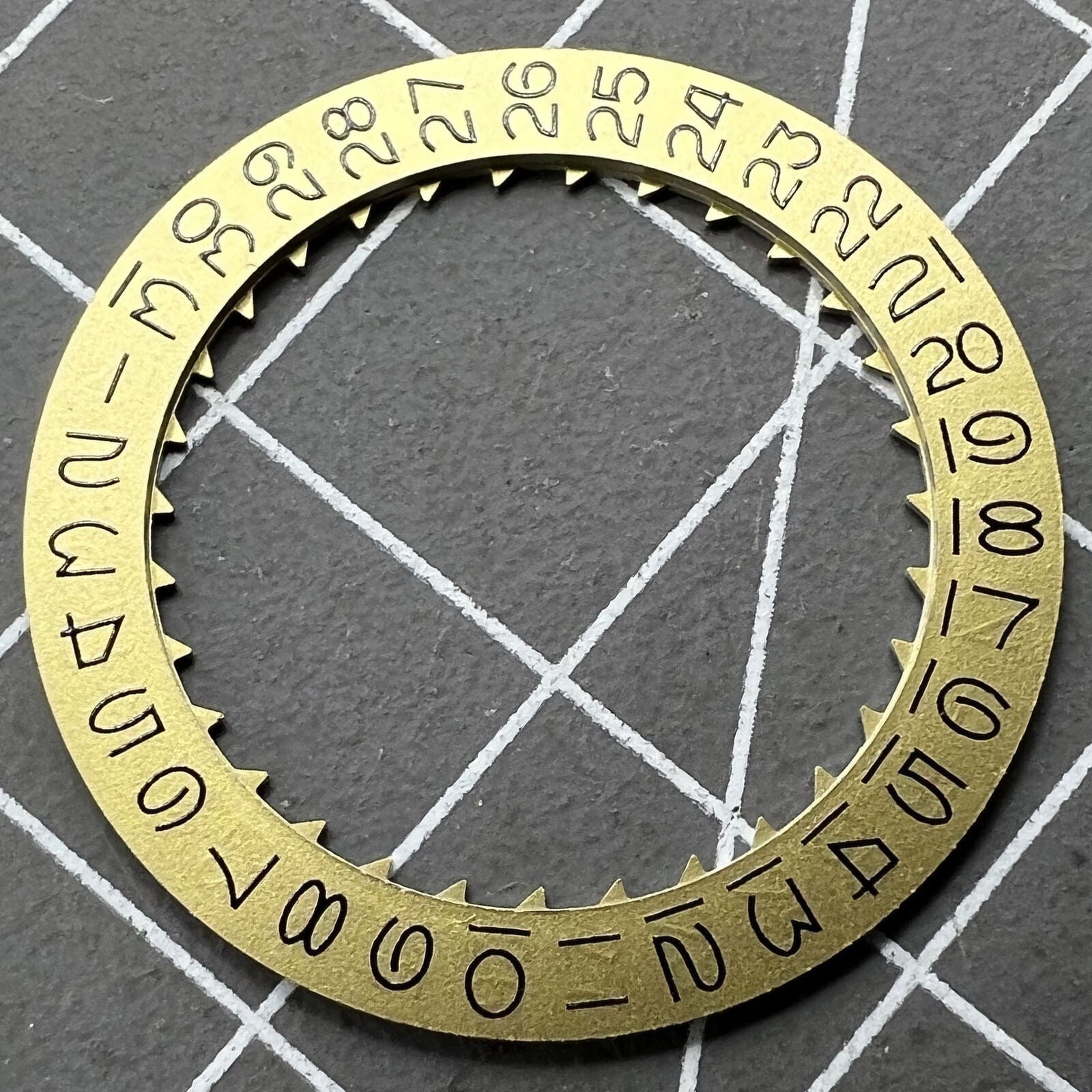 Golden date disk wheel with vintage numeral font for Miyota 8215 watch movement, precise replacement part.