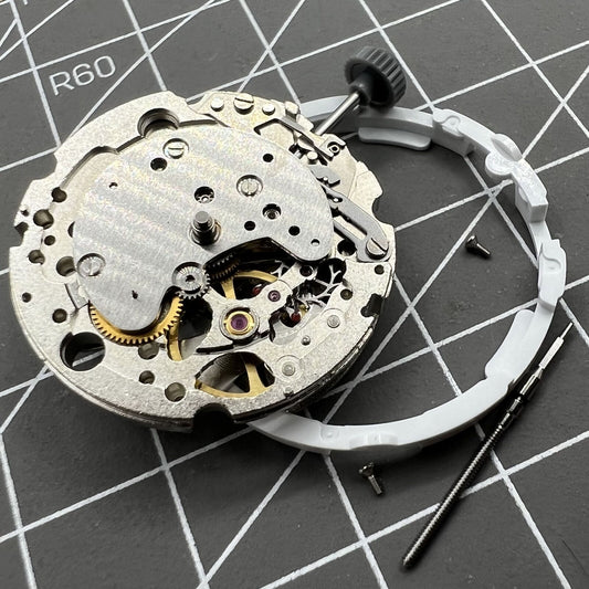 Miyota/Citizen 82S7 silver plated automatic watch movement for precise mechanical performance.