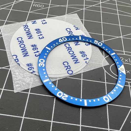 38 mm/31,5 mm blaue Ziffern-Uhrenlünetteneinlage aus Aluminium