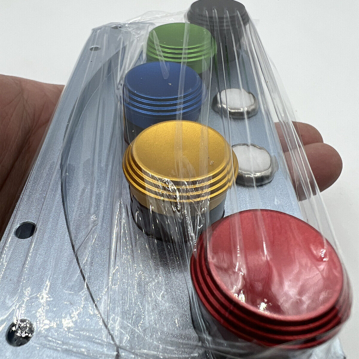 Silver oil cup stand with five die-cast alloy containers and oiler pen for precise watch repair.