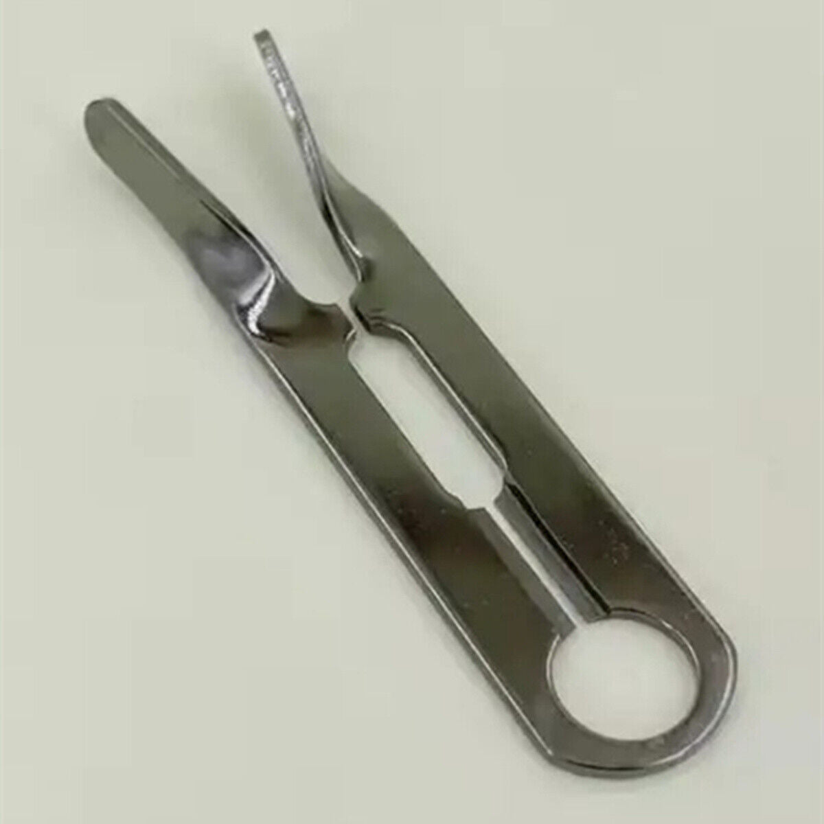 V-slot stainless steel watch roller remover tool by 2810 for precise watch repair and replacement tasks.