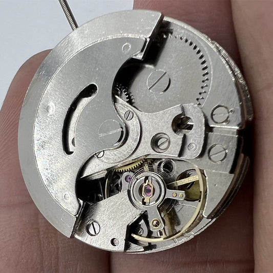 26.5mm 7120 automatic mechanical watch movement with single calendar and 3 hands, precision timekeeping.