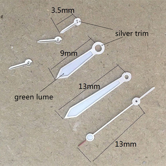 Arrow-shaped 13mm silver-trim watch hands with green lume for VD53 VD54 VD57 movements.