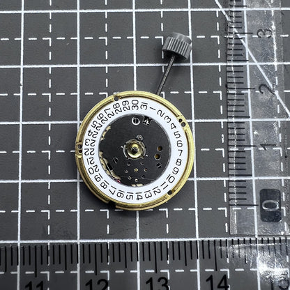 Swiss ETA F04.115 quartz watch movement with 3 hands and date display at 3 o'clock for precision timing.