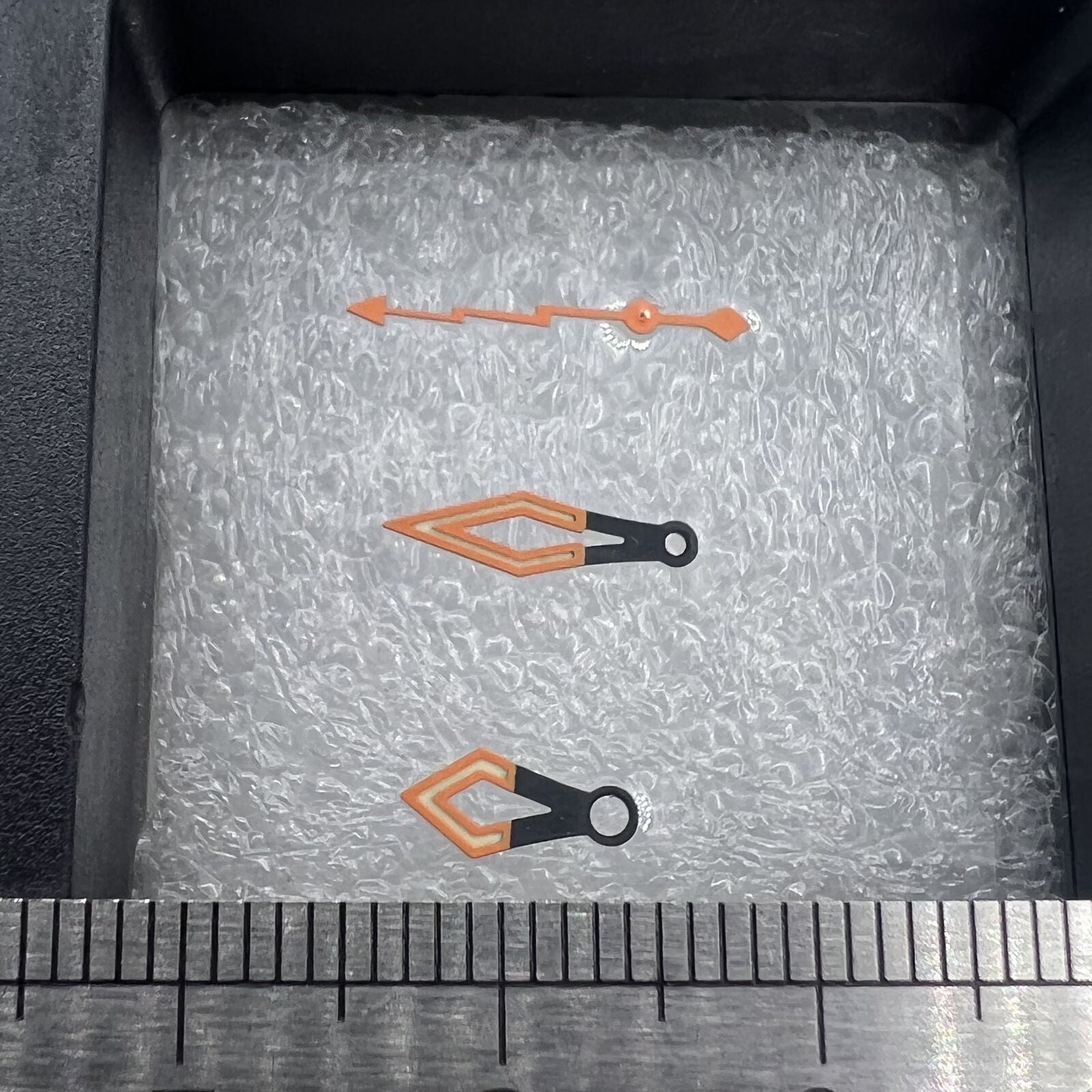 Black and orange butterfly watch hands with C3 green lume, compatible with NH35/36/4R movements, ideal for sporty timepieces.