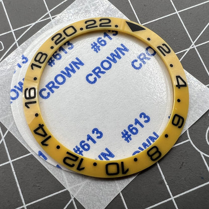 38mm ceramic Slope GMT bezel ring with black font for SUB007 watch, vibrant yellow background.
