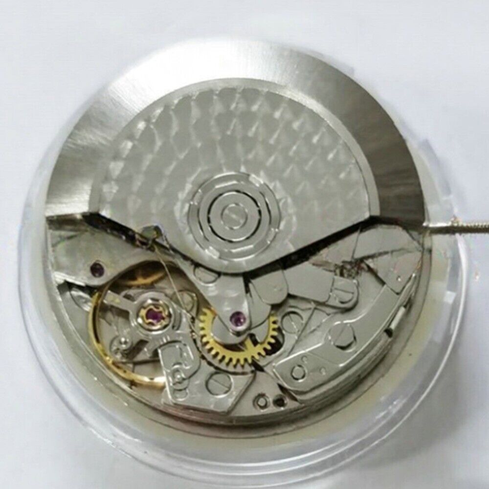 Dandong 7750 mechanical watch with small seconds at 3, 6, and 9 o'clock, black dial, date at 6.