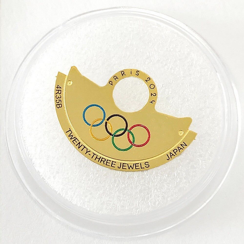 Revêtement métallique des cinq anneaux olympiques dorés pour le rotor du mouvement NH35 