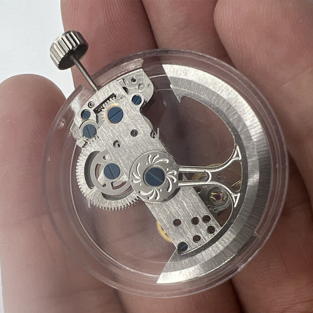 Asian LG0807 silver rectangular watch movement with visible balance wheel for automatic mechanical watches