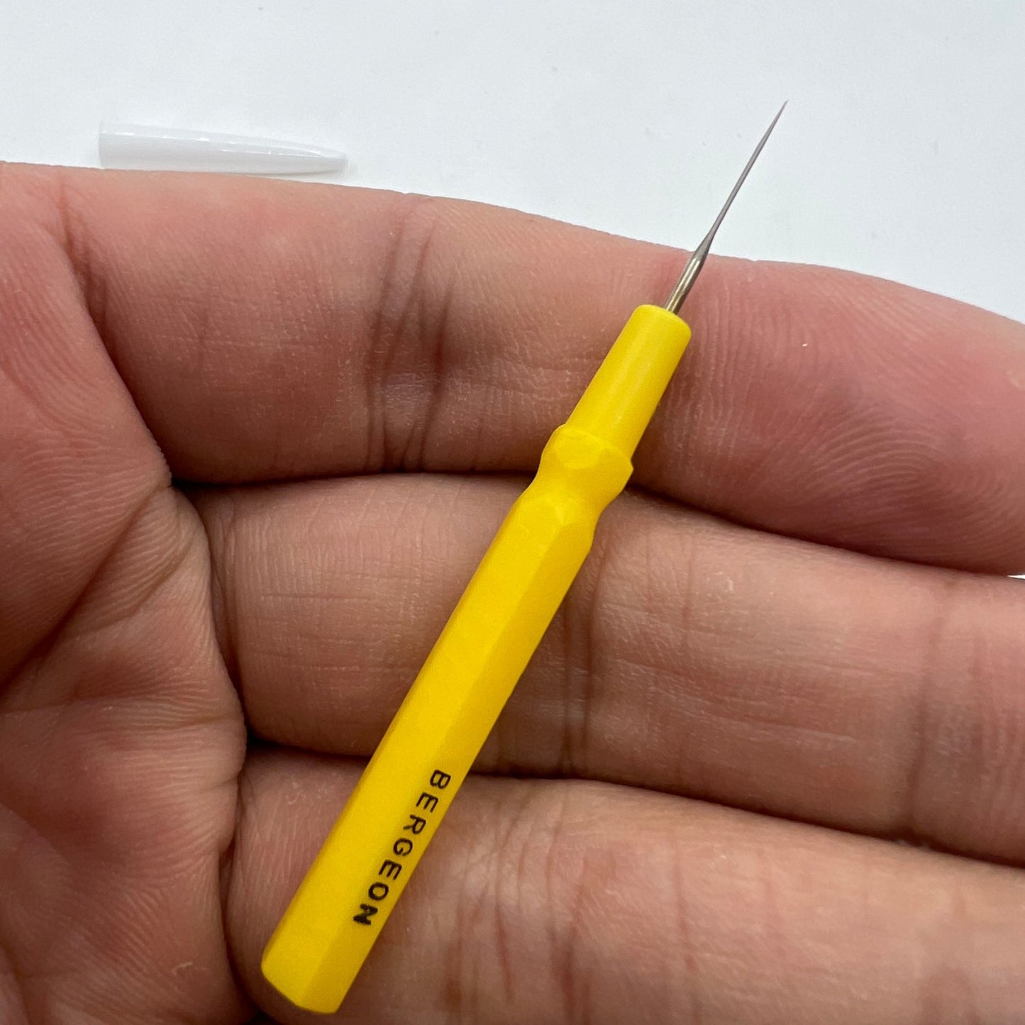 Bergeon 30102-D large yellow watch dip oiler for precise Swiss watch repair and maintenance.