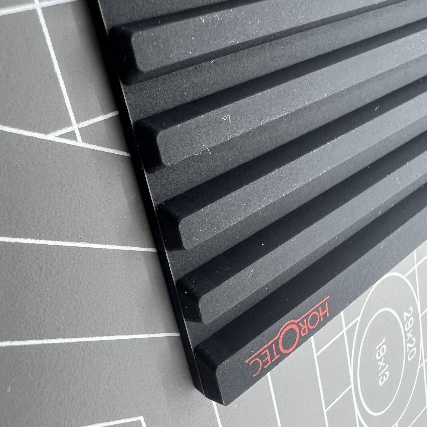 Swiss Horotec MSA24.223 black silicon bench mat with 32 grooves for secure watch accessory handling