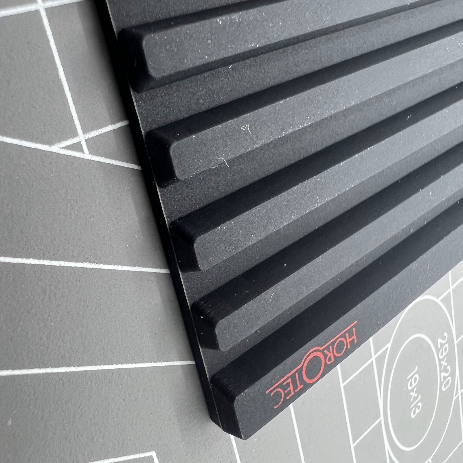 Swiss Horotec MSA24.223 black silicon bench mat with 32 grooves for secure watch accessory handling