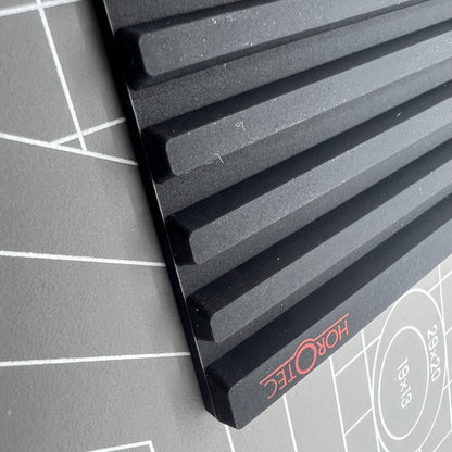 Swiss Horotec MSA24.223 black silicon bench mat with 32 grooves for secure watch accessory handling