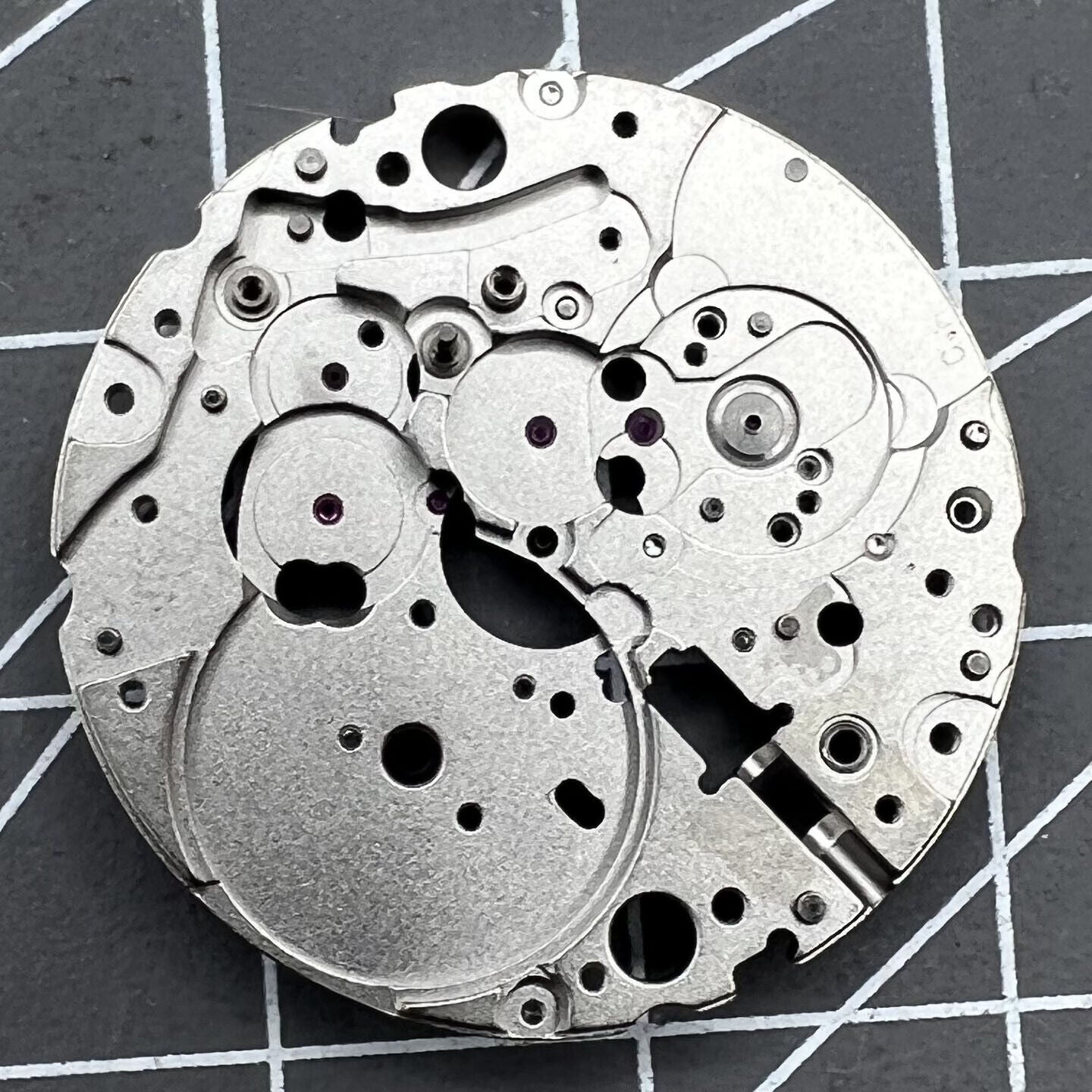 Main Wheel Bridge Splint for Miyota 9015 watch movement, precise replacement part for repairs.