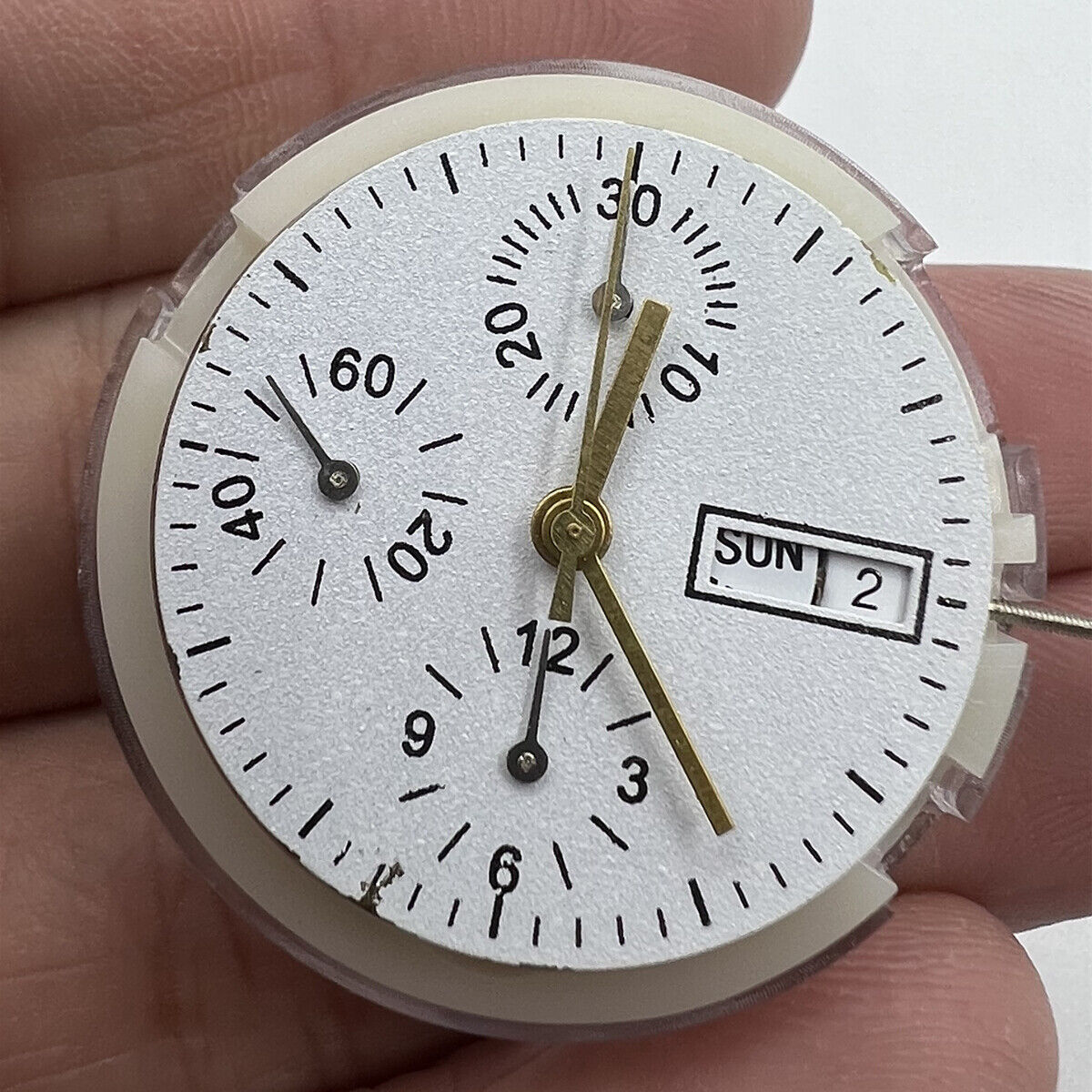 Asian 7750 automatic chronograph movement with day-date at 3 o'clock, precise ETA 7750 design.