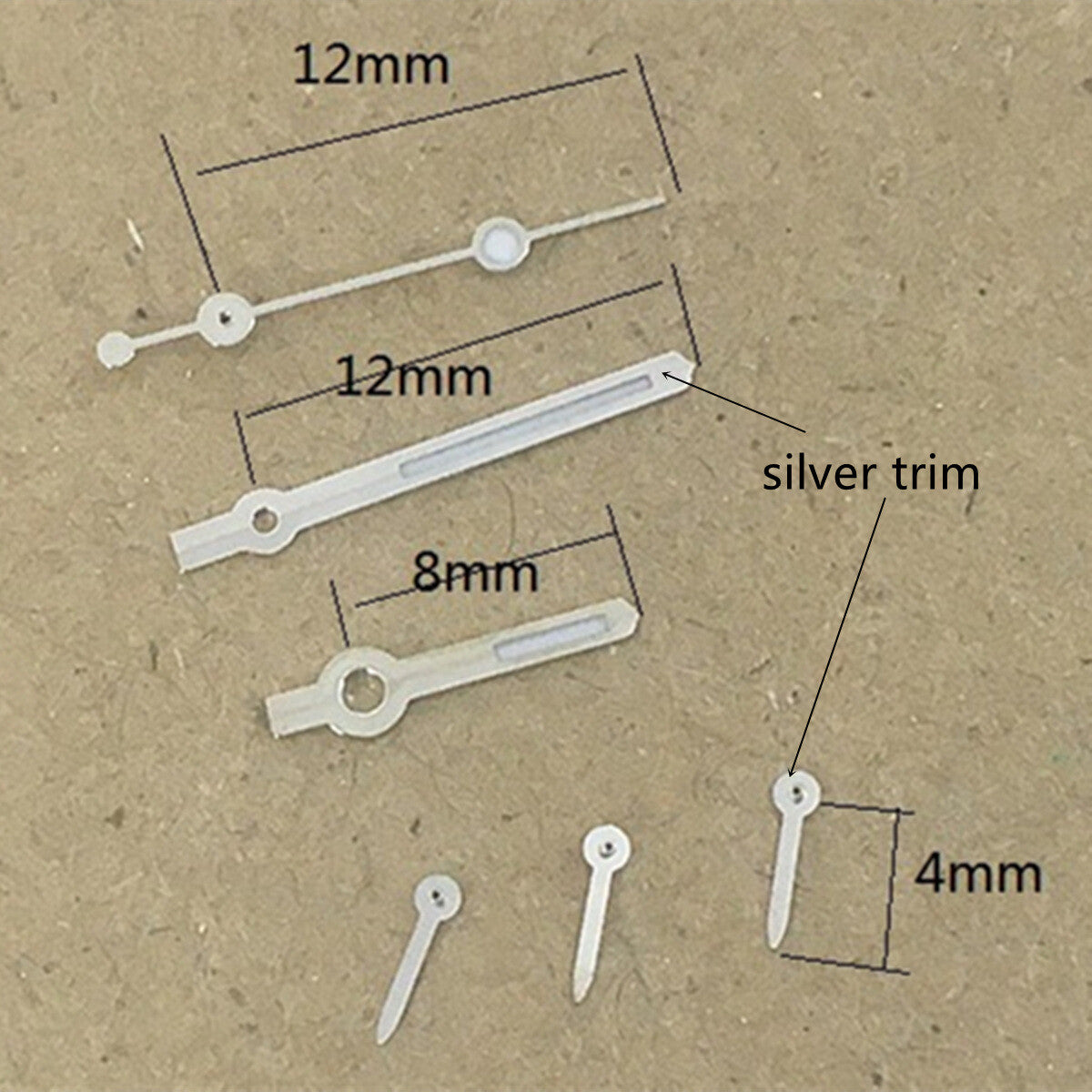 Arrow shaped silver trim green luminous watch hands for Hattori VD53 movement, enhancing visibility and style.