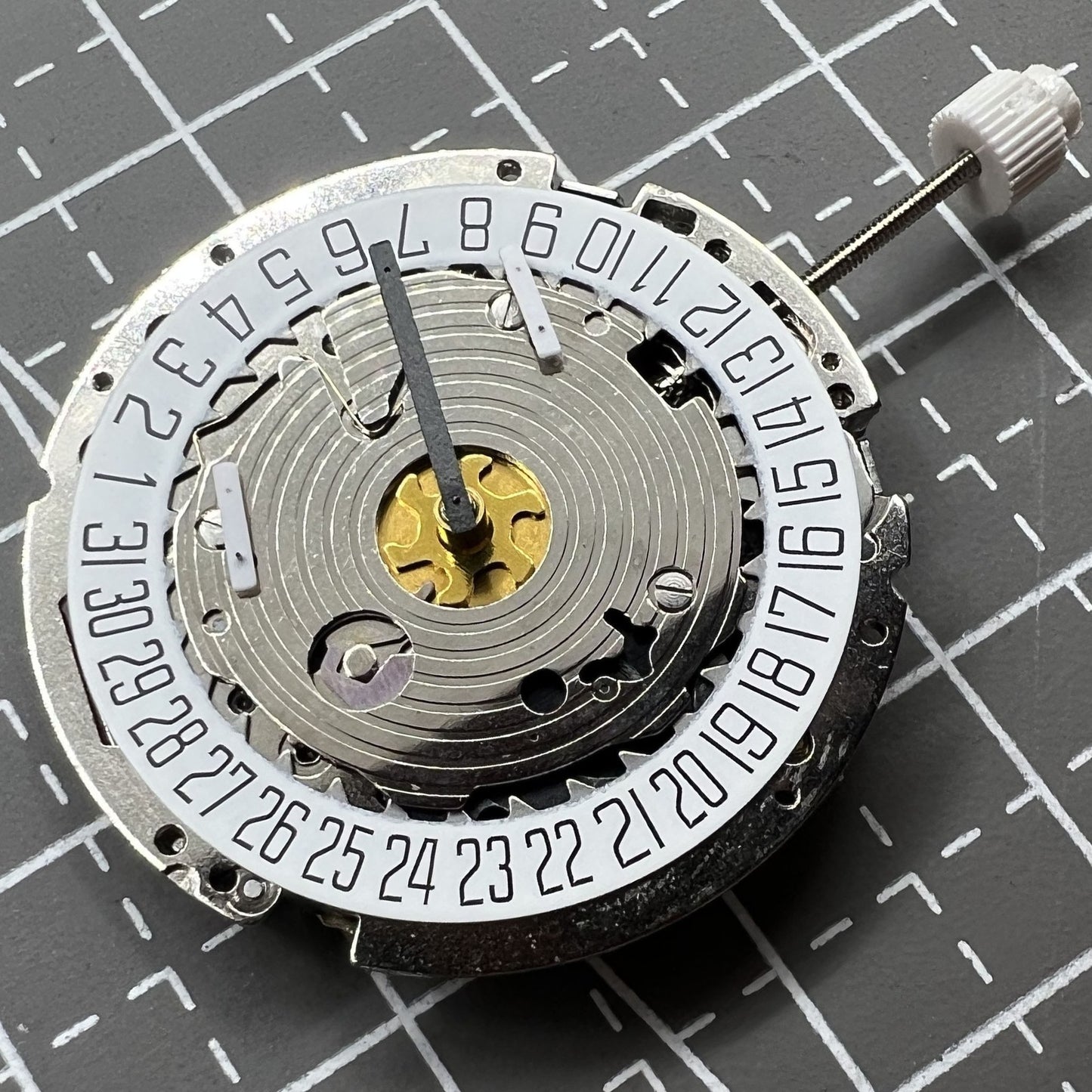 Silber ISA 8171 watch movement with 5 hands and white single calendar dial at 6 o?clock by Silber brand.