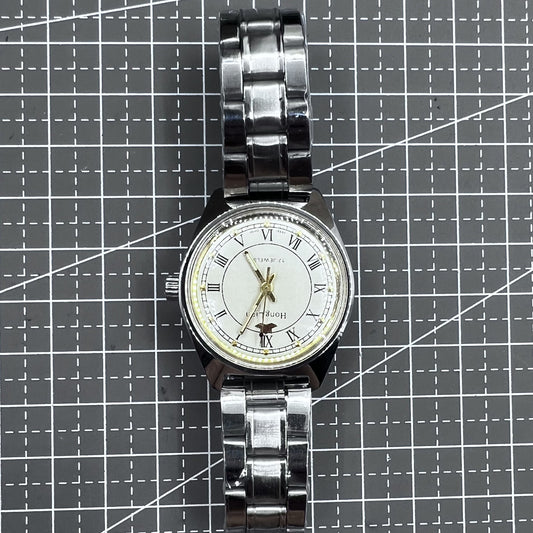 32mm Silver HONGLIAN manual watch with 17 jewels and Roman numeral dial design