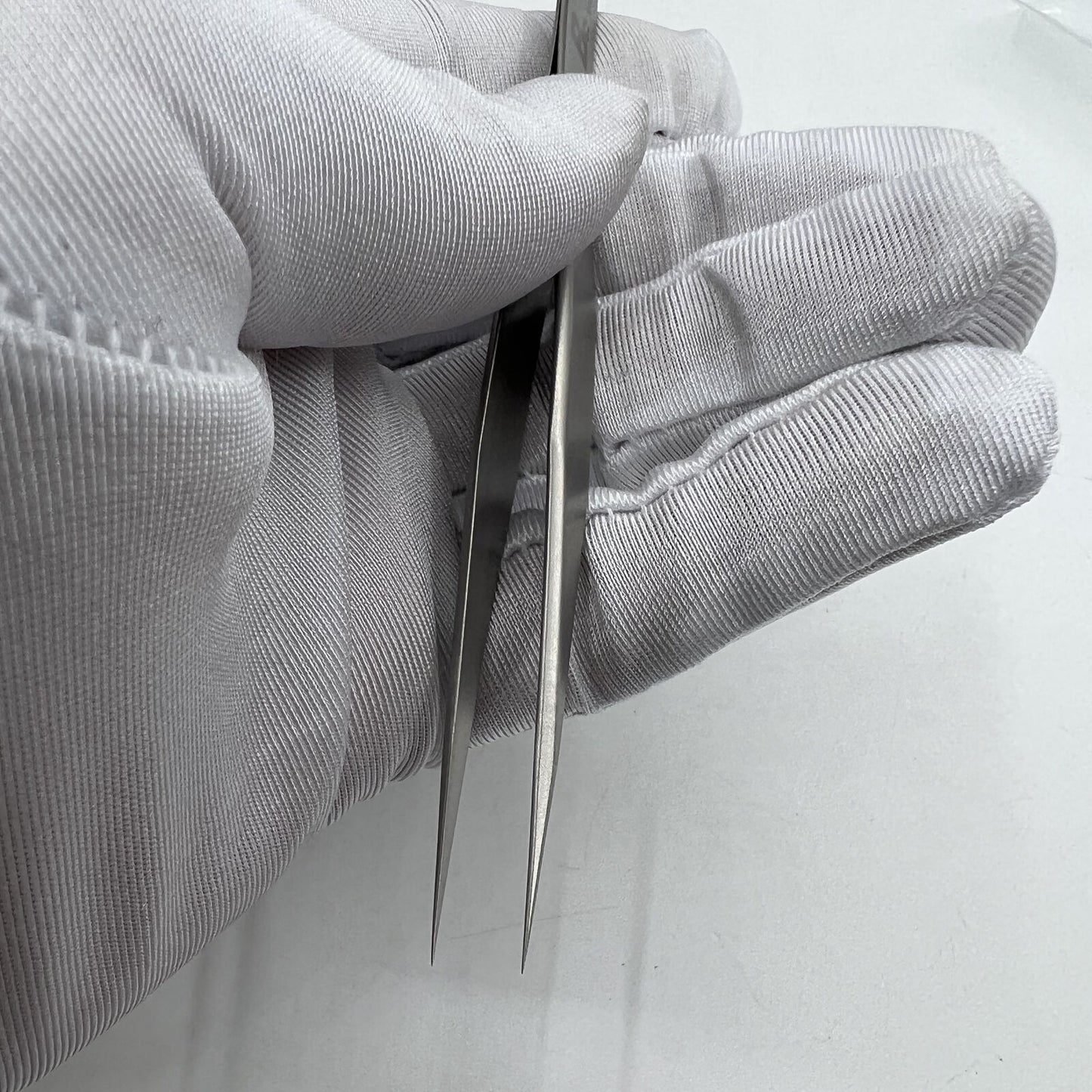 Swiss Bergeon 7026-3 antimagnetic fine hairspring tweezers for precise watch repair.