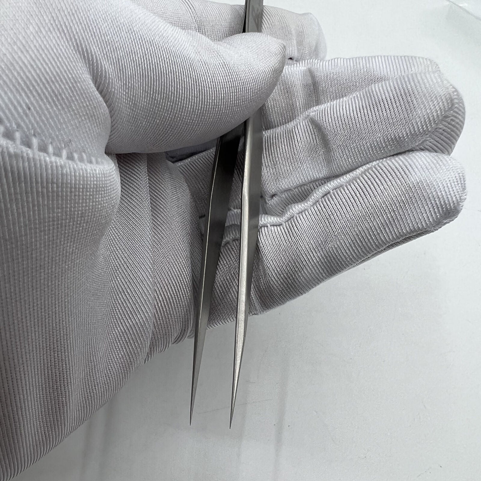 Swiss Bergeon 7026-3 antimagnetic fine hairspring tweezers for precise watch repair.