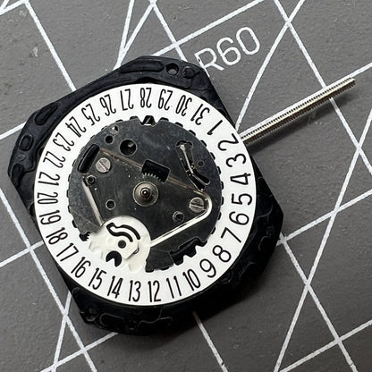 VX22 quartz watch movement with date at 3 and 6 o'clock, white disk, Japan made by Seiko.