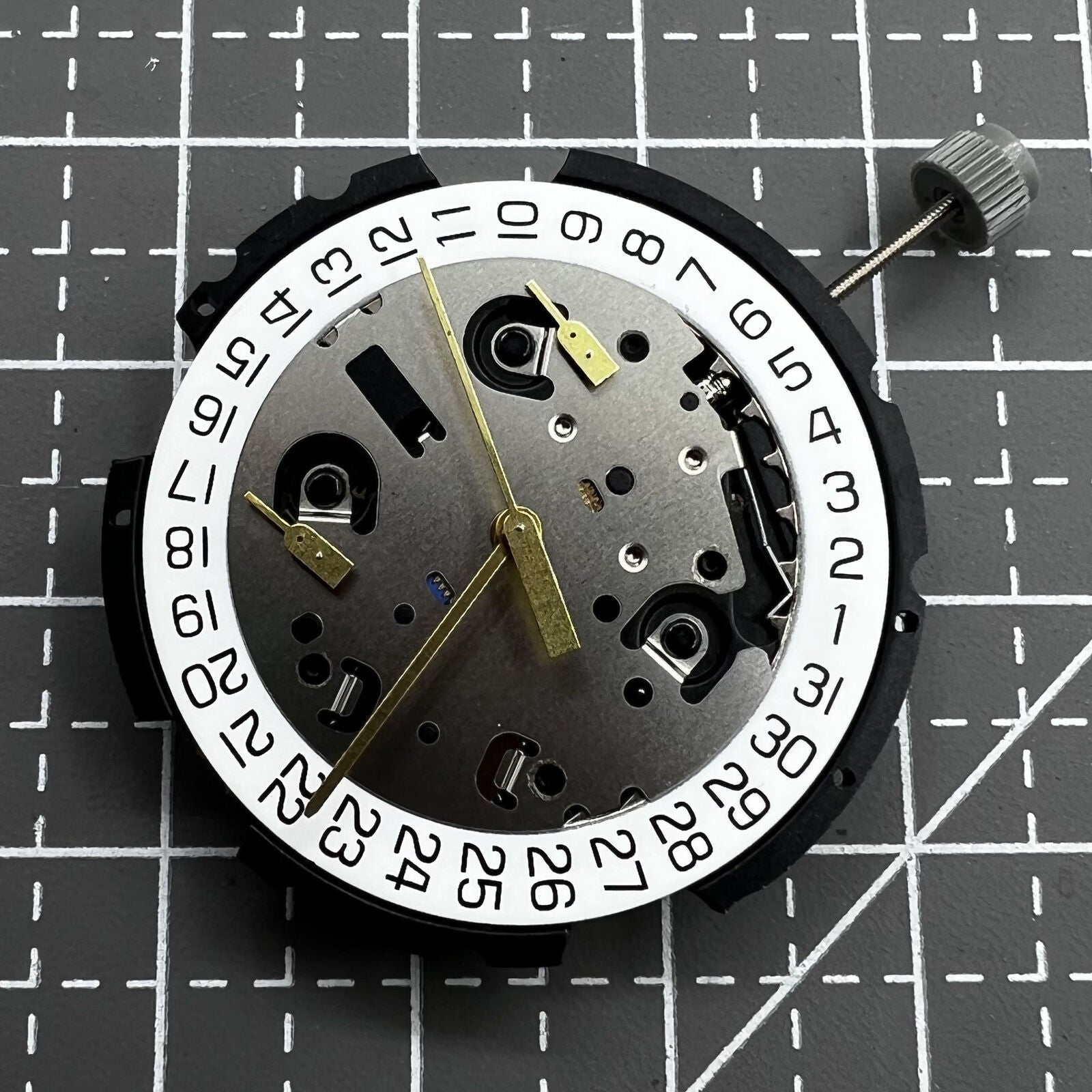 ETA G10.212 quartz watch movement showing three hands and date display by ETA brand.