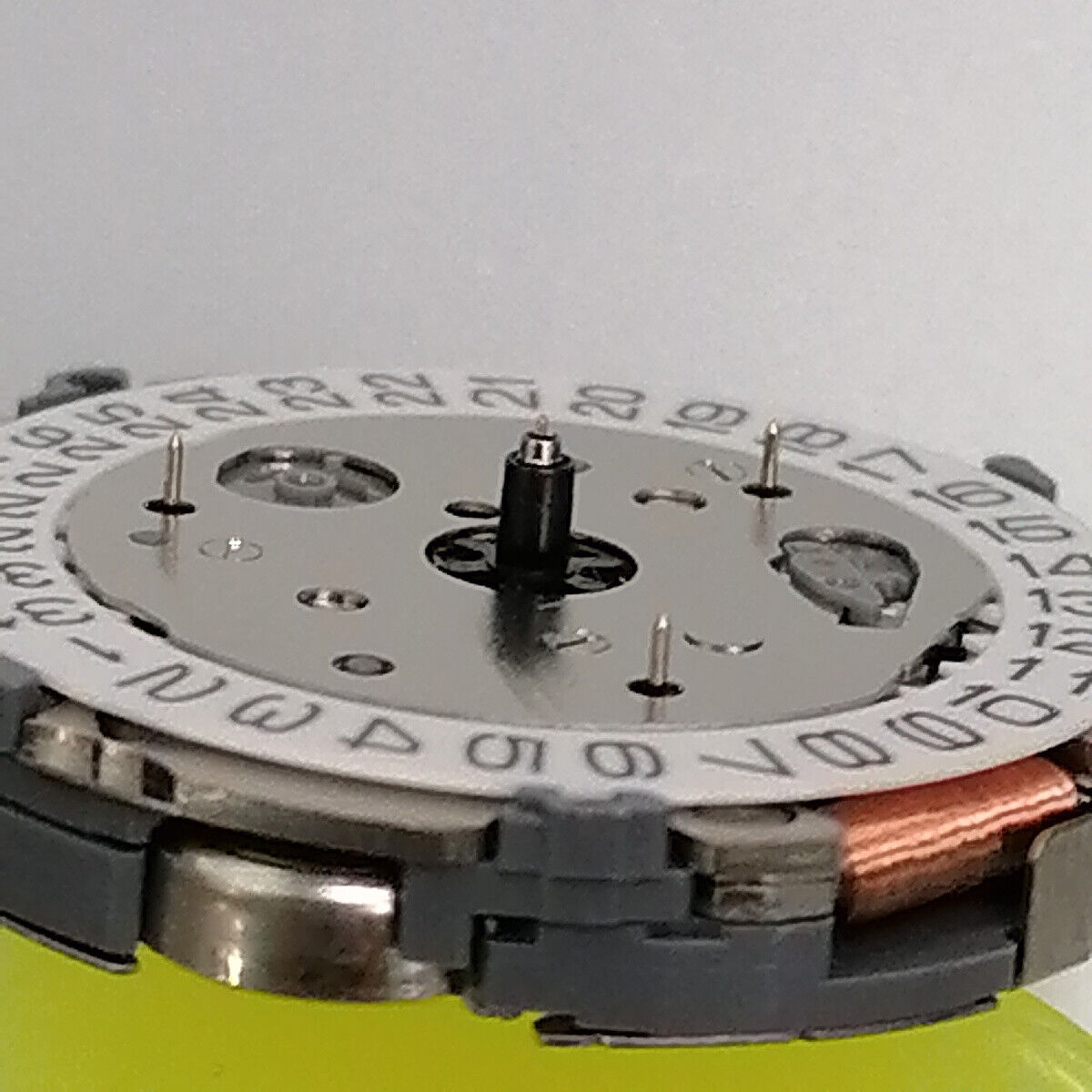 Miyota FS04 quartz watch movement showing multifunction calendar and small second features for precise timekeeping.