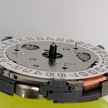 Miyota FS04 quartz watch movement showing multifunction calendar and small second features for precise timekeeping.