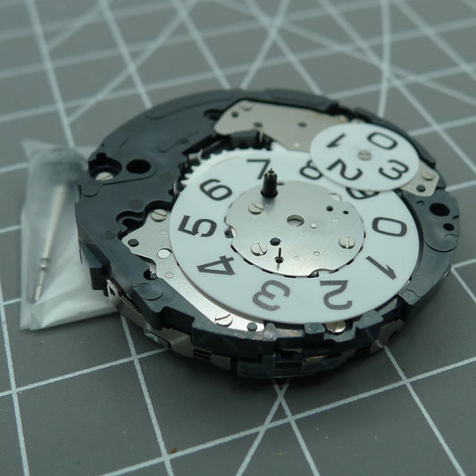 Miyota 6S50 quartz watch movement showing date at 12, small seconds at 3, 6, and 9 positions