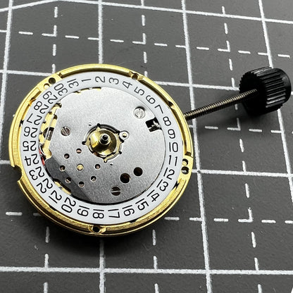 ETA F03.115 quartz movement with date window at 3 o'clock, precise three-hand watch component by ETA.