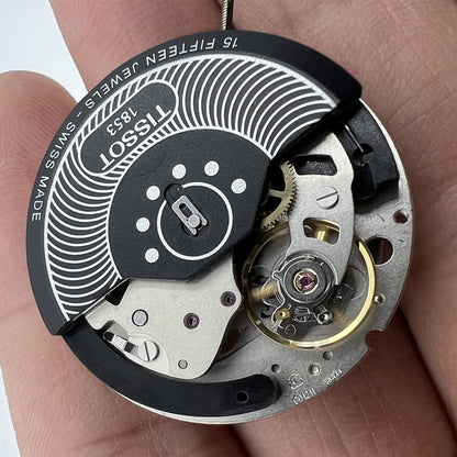Tissot ETA C01.211 chronograph movement with black dial, precision mechanical watch accessory for timing.