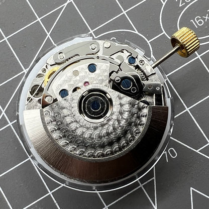 Black Dandong watch strap featuring automatic mechanical movement and small second dial at 9 o'clock for precise timekeeping.