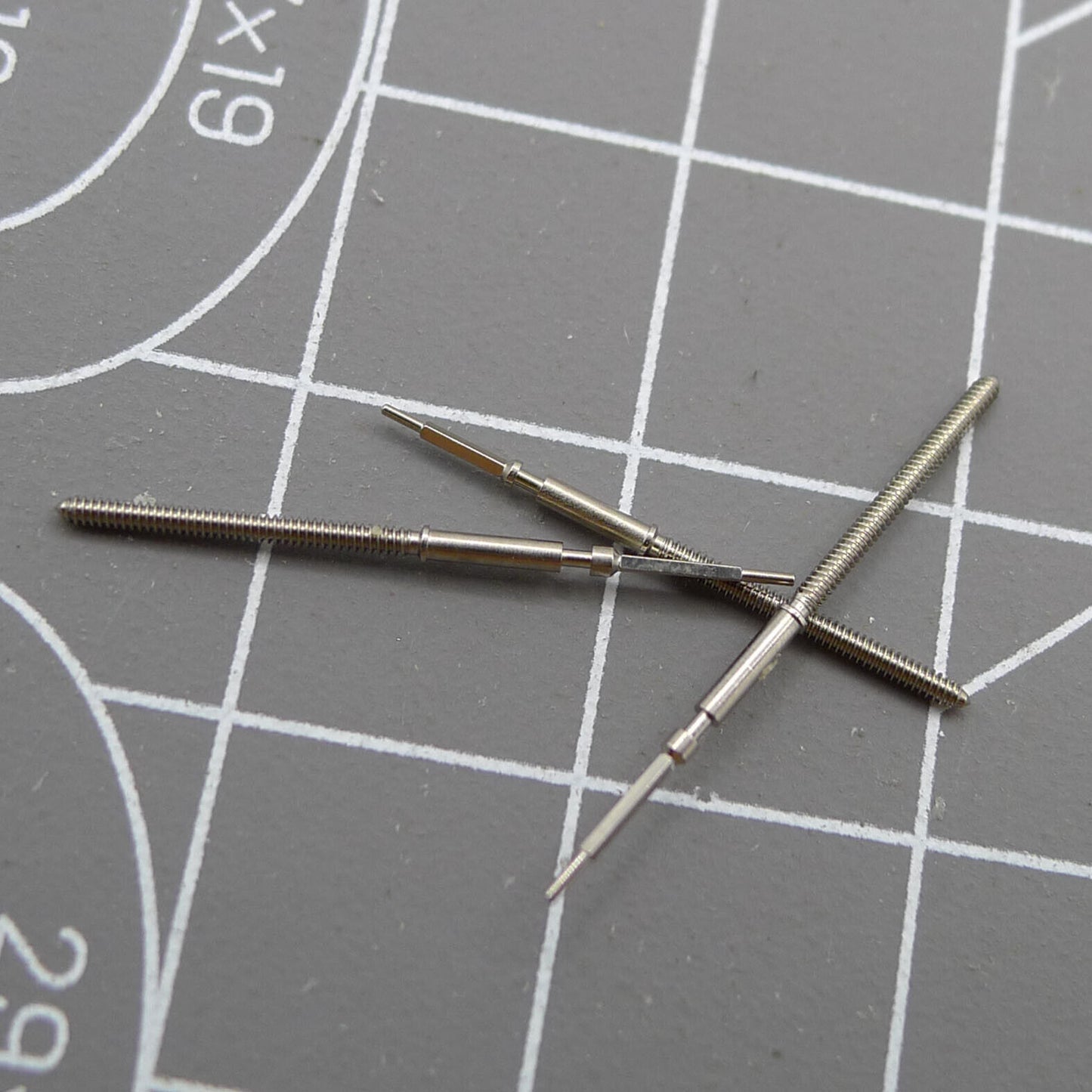 Watch winding stem for Ronda 6003D quartz movement, precise fit for winding and time setting.