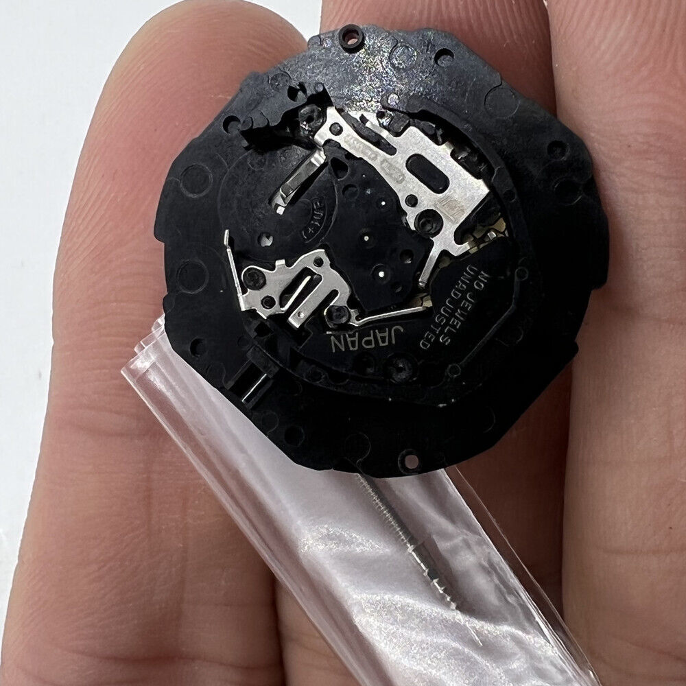 Hattori Epson TMI PC33 quartz watch movement, precision Japanese craftsmanship for reliable timekeeping.