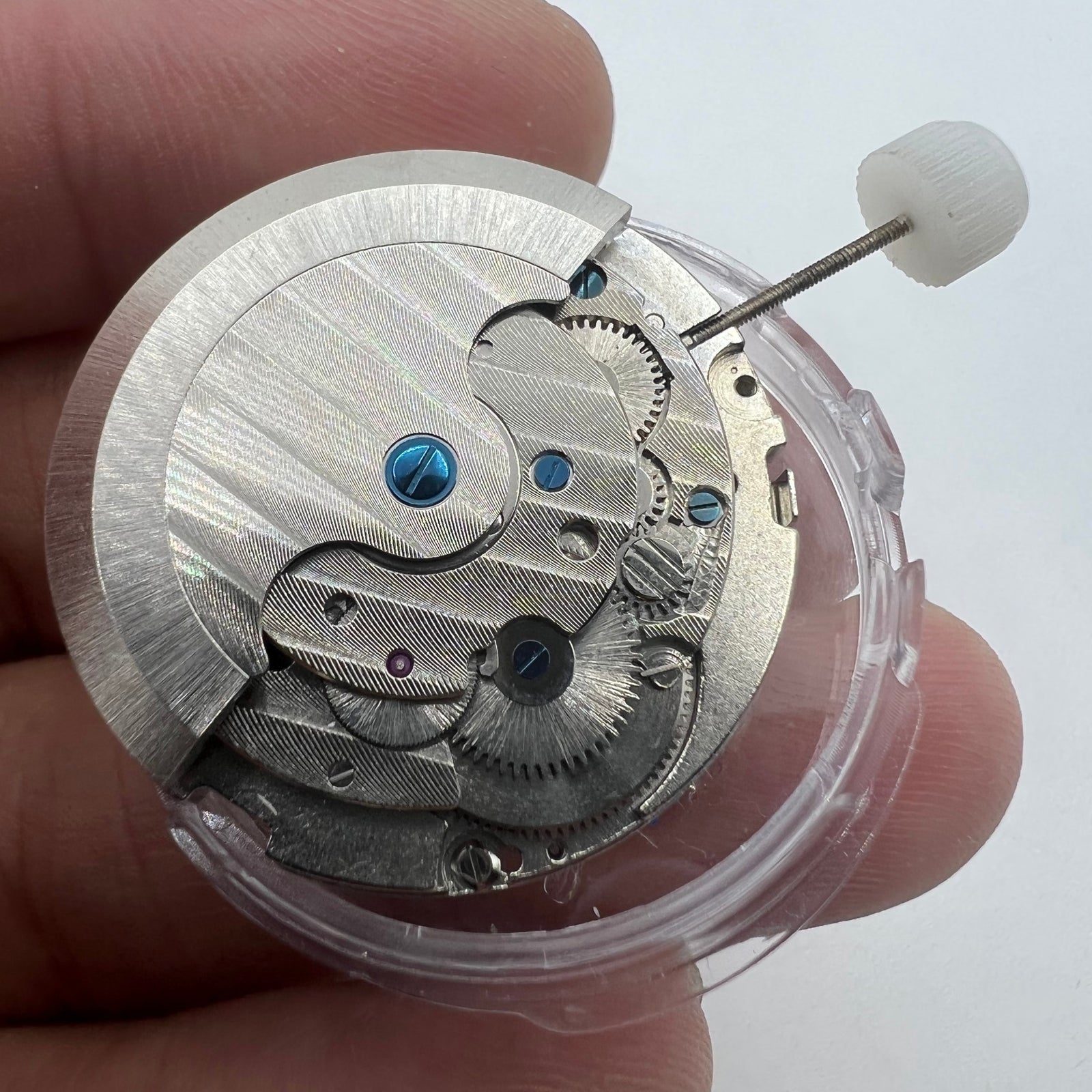 LB20 China Made watch accessory showcasing multifunctional automatic mechanical movement with date display at 12 o'clock.