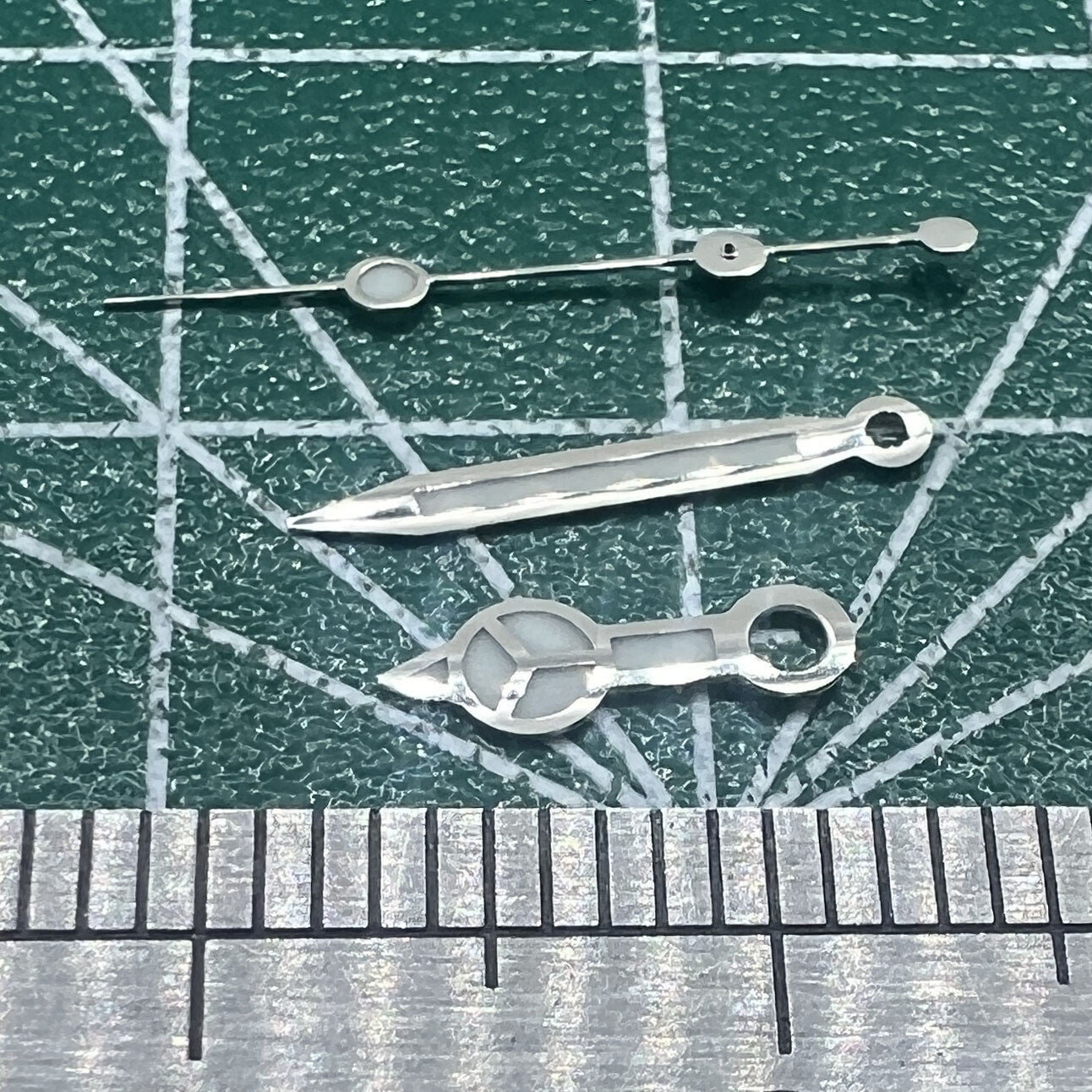 Green luminous silver-trimmed 12.5mm watch hands for Miyota NH35/NH36/NH38 movements.
