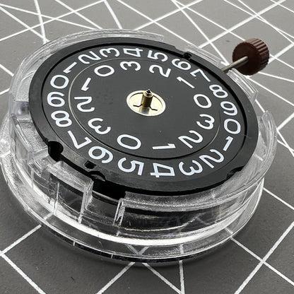 Swiss Ronda 509 quartz watch movement with black disk date at 3, precise timing for accessories.