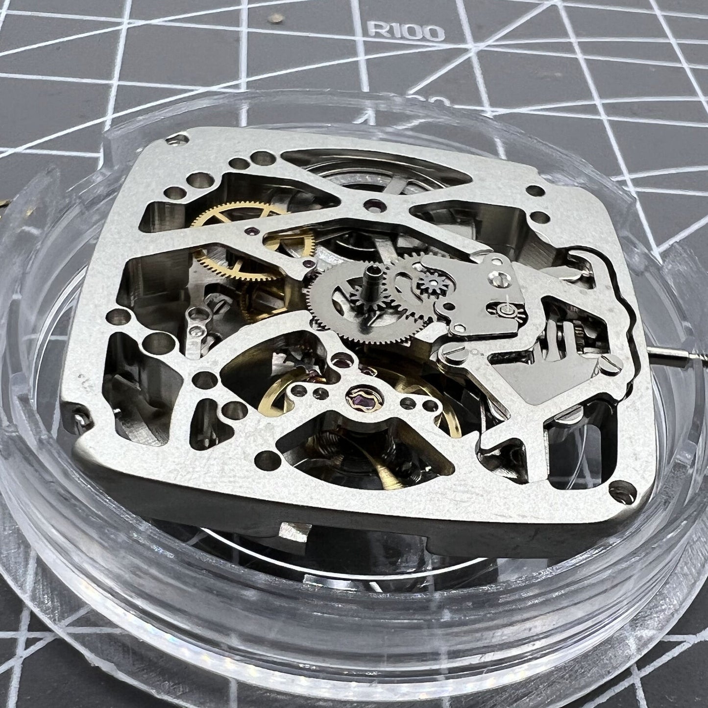 Tianjin Seagull ST25 square watch with silver hollow dial and automatic mechanical movement.