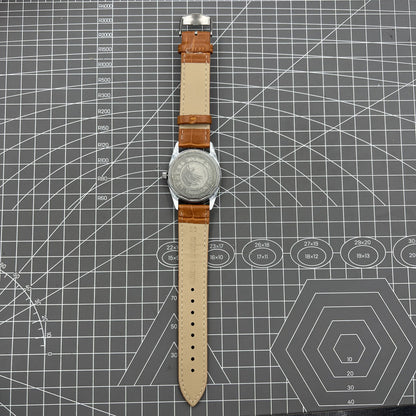 TAIHANG 38mm mechanical watch with silver dial, gold markers, round case, and 17-jewel movement.