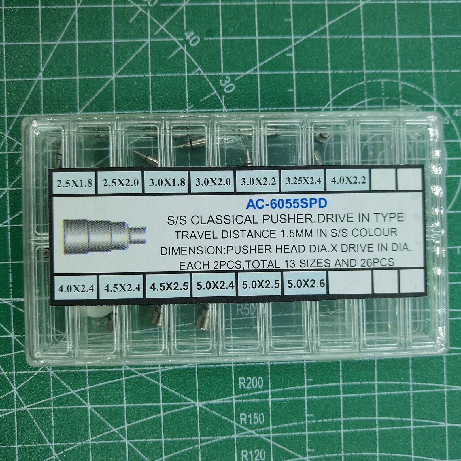 Set of 26 stainless steel chronograph button watch pushers, screw-in type, ideal for watch repairs and upgrades.