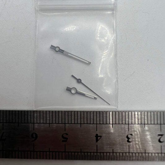 Silver-trimmed green luminous watch hands for NH35/NH36 with enhanced visibility, ideal for Seiko movements.